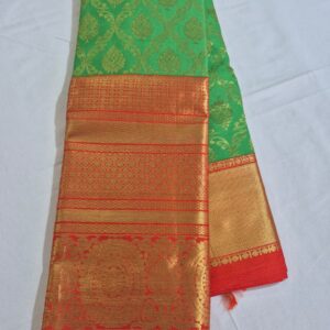 Traditional Green Silk Saree with Rich Gold Zari Pallu & Red Border